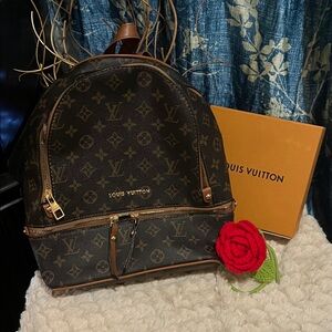 nwt Monogram Backpack with faux front pocket